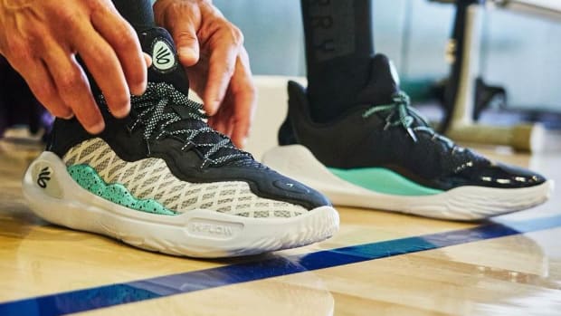 View of Stephen Curry's black and white shoes.
